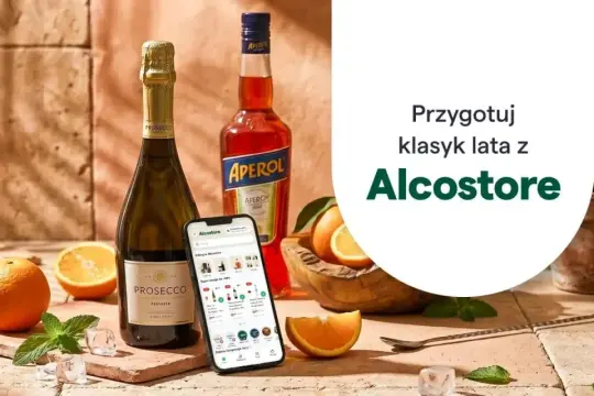 Butelka Aperolu, Prosecco, pomarańcze i telefon z aplikacją Alcostore. Idealne składniki, by przygotować drinki, z czym pić Aperol.
